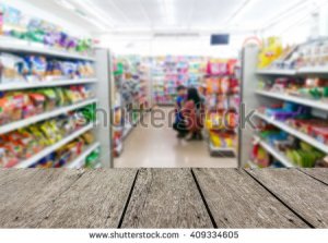 stock-photo-look-out-from-the-table-blur-image-of-inside-convenience-store-as-background-409334605